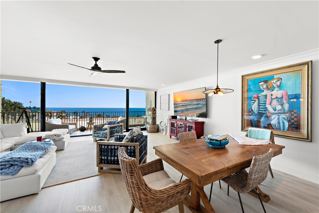 405 Avenida Granada, Unit 312 San Clemente, CA 92672 - Photo 5 of 43 a living room with furniture kitchen view and a large window