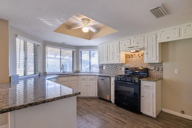 a view of a livingroom with a flat screen tv