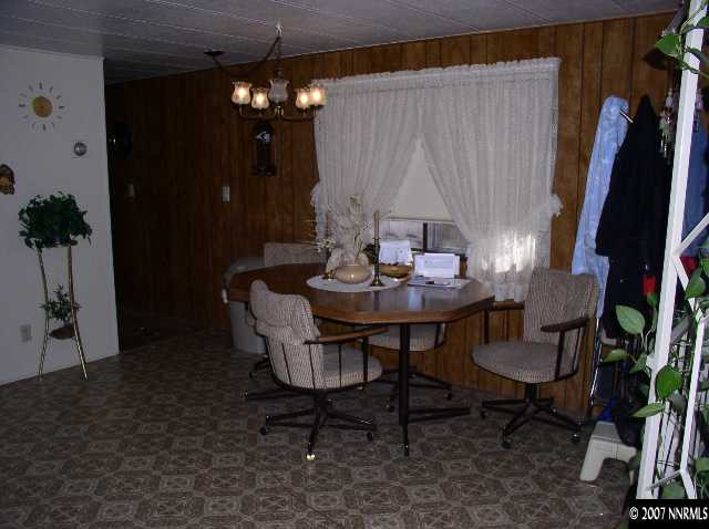 15075 Rhyolite Circle Reno, NV 89521 - Photo 3 of 9 a dining room with furniture and window