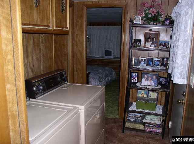 15075 Rhyolite Circle Reno, NV 89521 - Photo 7 of 9 a room with storage and utility