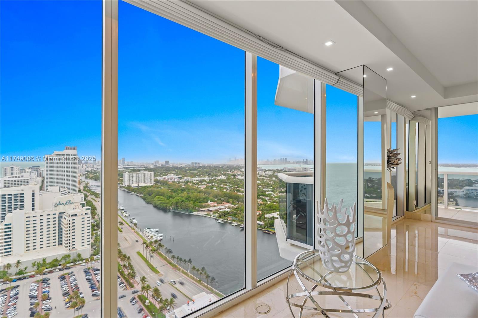 4775 Collins Avenue, Unit 3505 Miami Beach, FL 33140 - Photo 17 of 73 a view of a city from a balcony