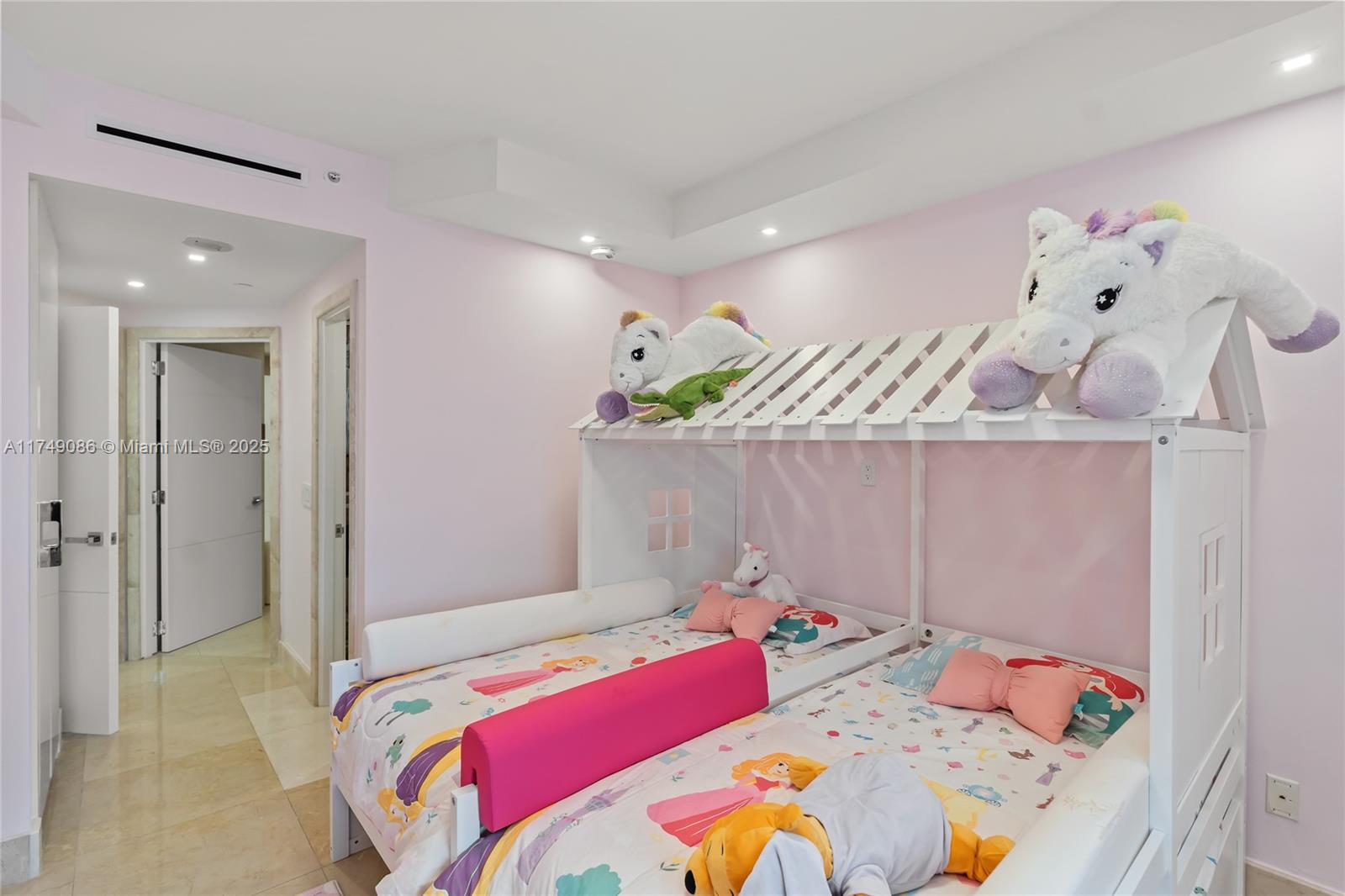 4775 Collins Avenue, Unit 3505 Miami Beach, FL 33140 - Photo 44 of 73 a bedroom with a bed and hallway