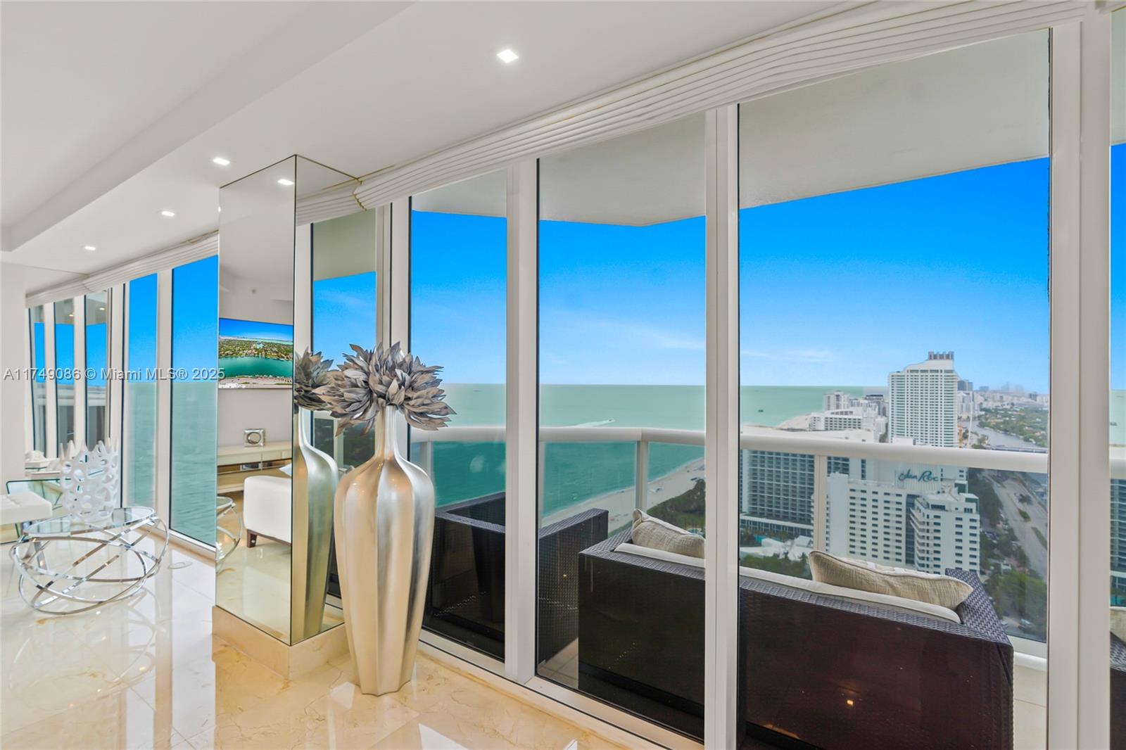 4775 Collins Avenue, Unit 3505 Miami Beach, FL 33140 - Photo 10 of 73 a view of a living room with furniture