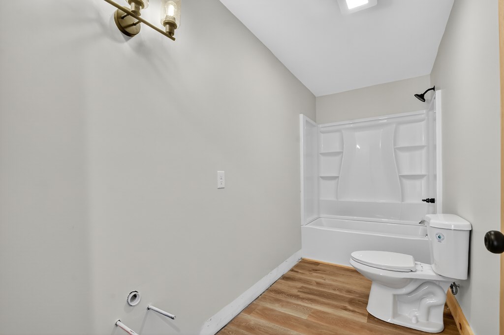 569 No 20 Mine Road McCaysville, GA 30555 - Photo 19 of 29 a bathroom with a toilet and a shower