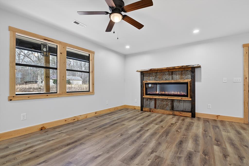 569 No 20 Mine Road McCaysville, GA 30555 - Photo 28 of 29 a bedroom with a bed and a window