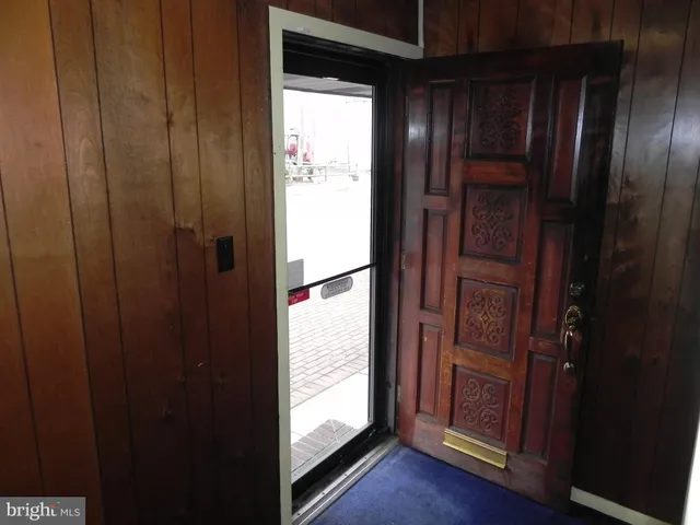 a view of elevator with hallway
