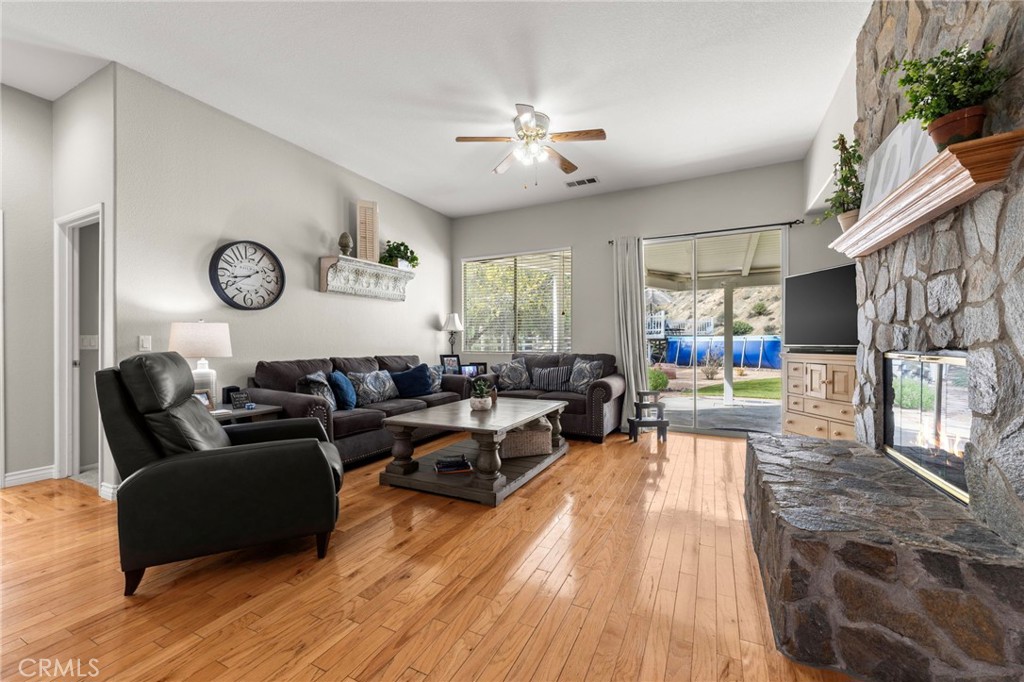 34423 Desert Road Acton, CA 93510 - Photo 21 of 53 a living room with furniture and a wooden floor