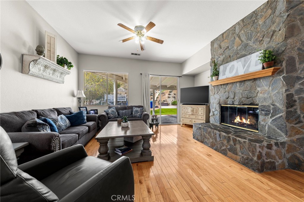34423 Desert Road Acton, CA 93510 - Photo 22 of 53 a living room with furniture and a fireplace