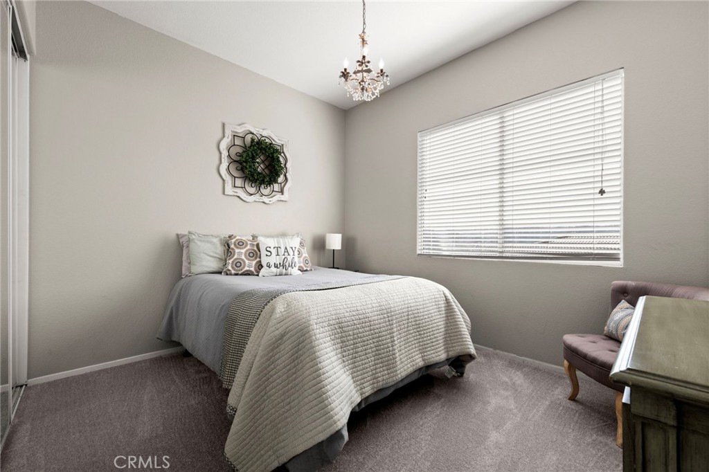 34423 Desert Road Acton, CA 93510 - Photo 25 of 53 a bedroom with a bed and a window