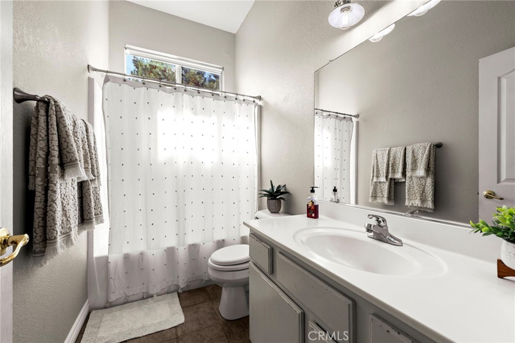 34423 Desert Road Acton, CA 93510 - Photo 26 of 53 a bathroom with a sink toilet and shower