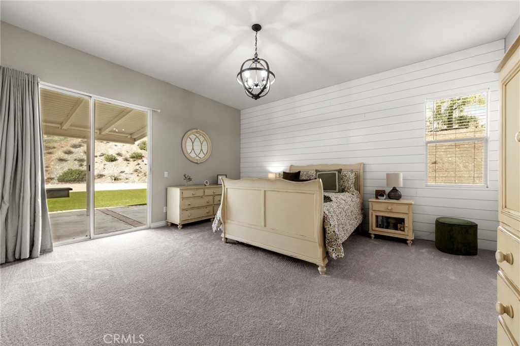 34423 Desert Road Acton, CA 93510 - Photo 31 of 53 a bedroom with bed and a window