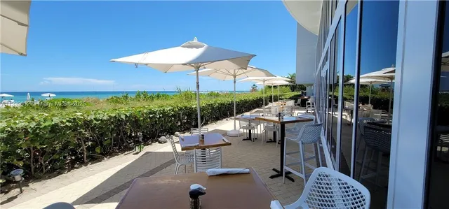 a view of a patio with chair and table