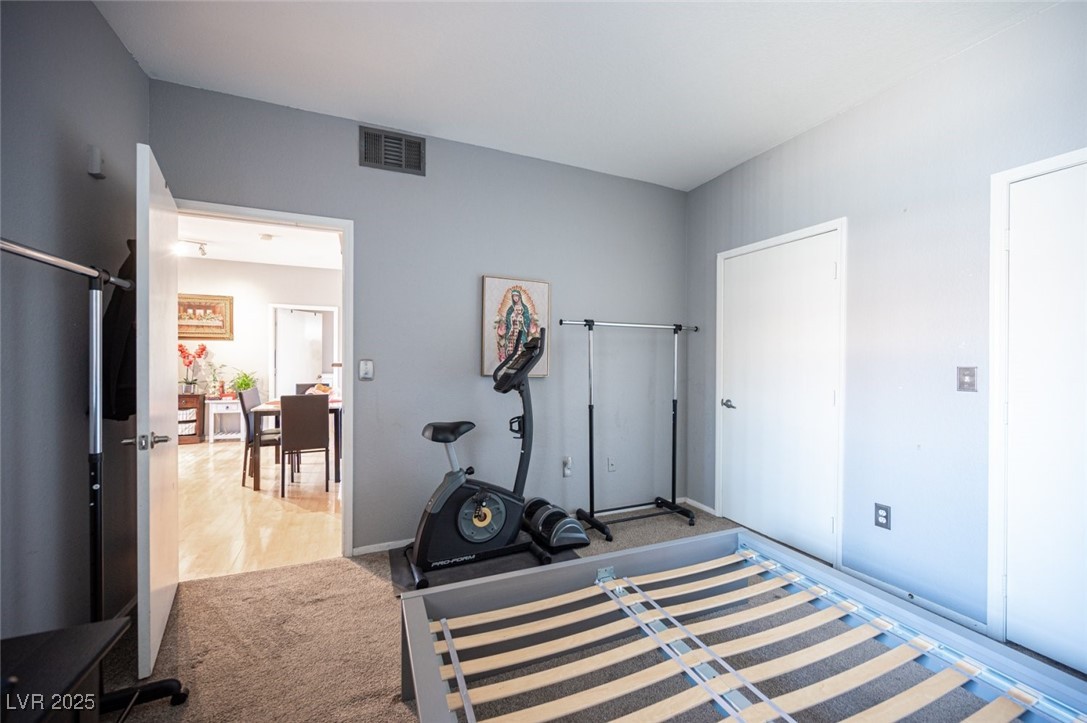 6650 West Warm Springs Road, Unit 1079 Las Vegas, NV 89118 - Photo 26 of 37 Workout area with carpet flooring and visible vents