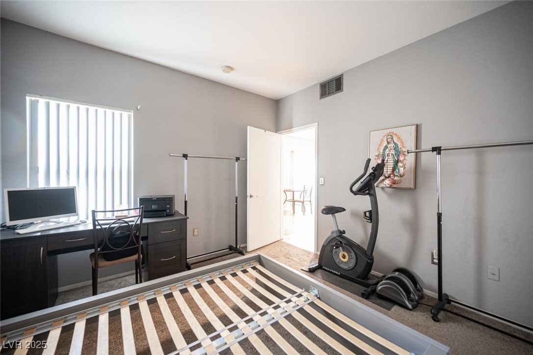 6650 West Warm Springs Road, Unit 1079 Las Vegas, NV 89118 - Photo 27 of 37 Home office with carpet flooring and visible vents
