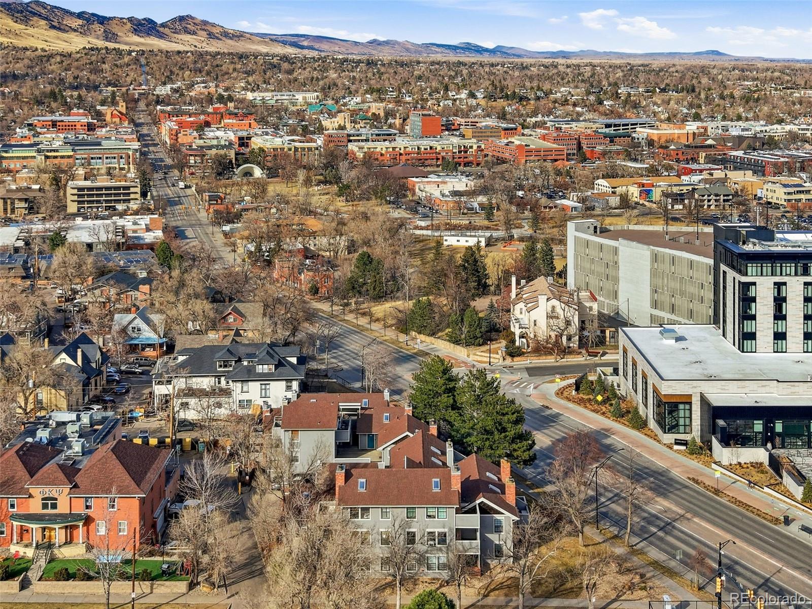 1405 Broadway, Unit 206 Boulder, CO 80302 - Photo 46 of 47 an aerial view of a city with lots of residential buildings