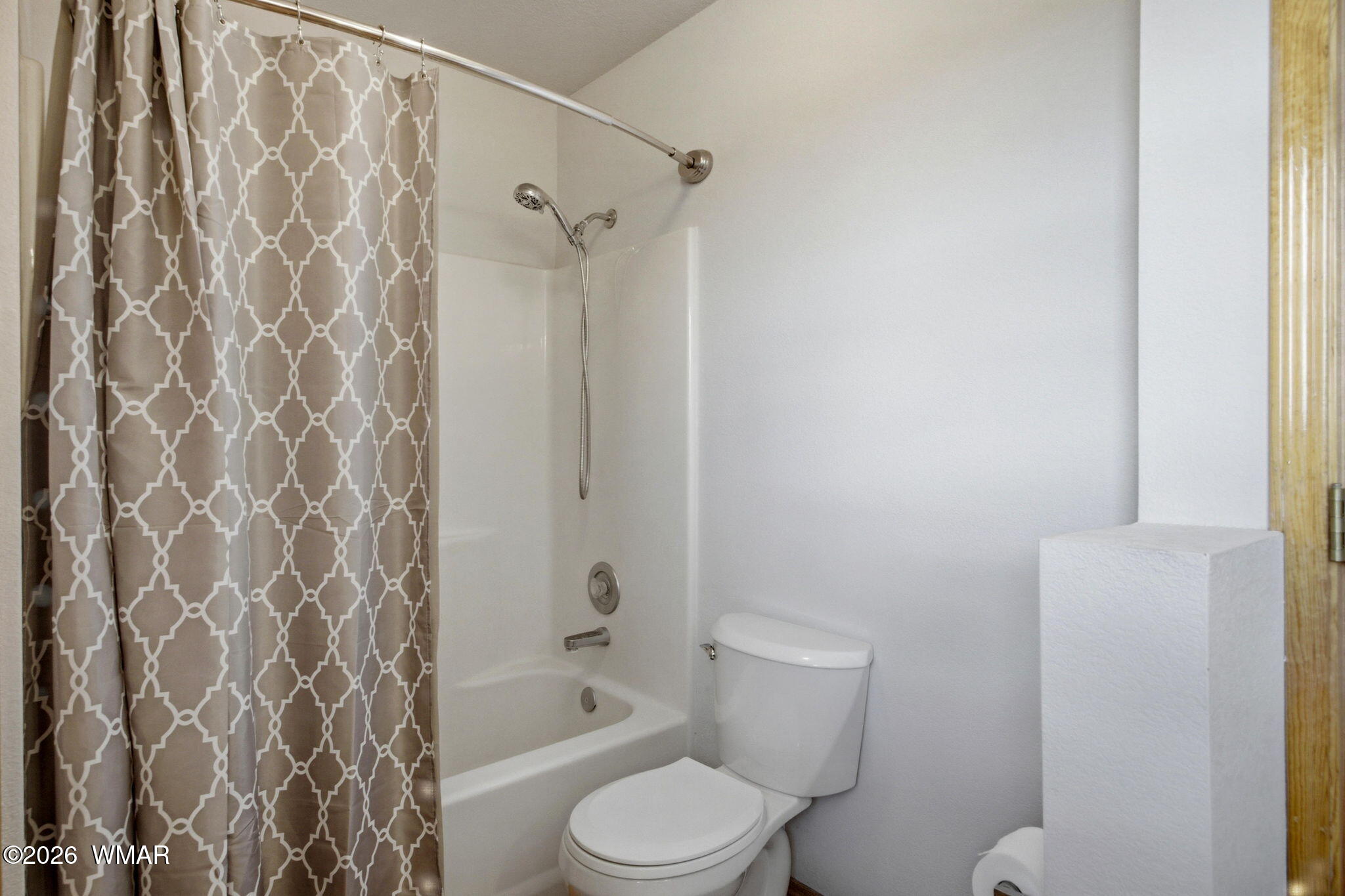 2806 Sky Hawk Drive Overgaard, AZ 85933 - Photo 28 of 43 a white toilet sitting next to a bath tub