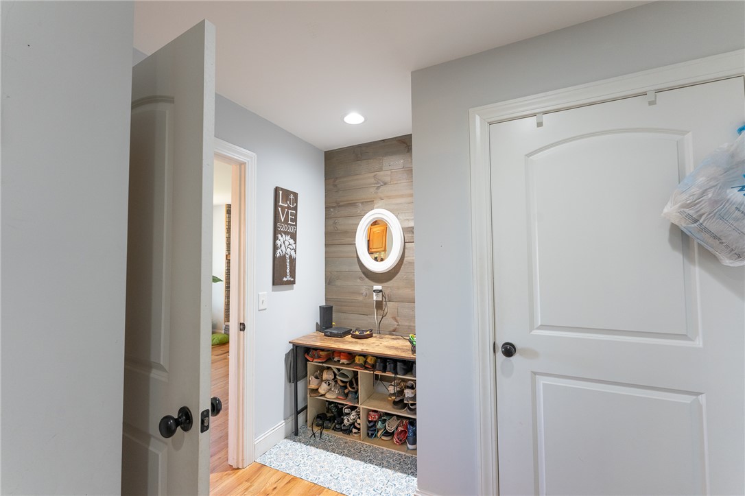 696 Mt Olivet Road Six Mile, SC 29682 - Photo 19 of 35 This inviting entry features warm wood tones and bright lighting, perfect for welcoming guests.