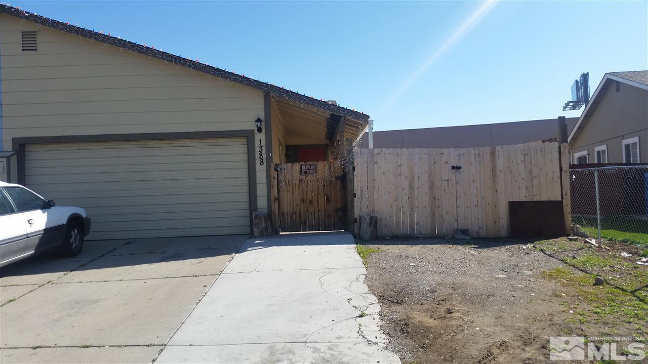 1388 Butler Street Reno, NV 89512 - Photo 1 of 1 a backyard of a house