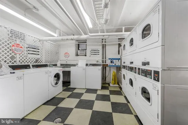a view of a terrace with furniture and a kitchen