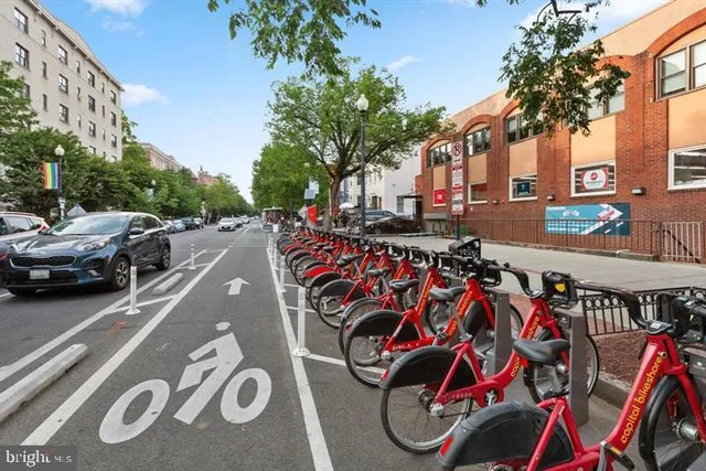 a view of a cafe with sitting area