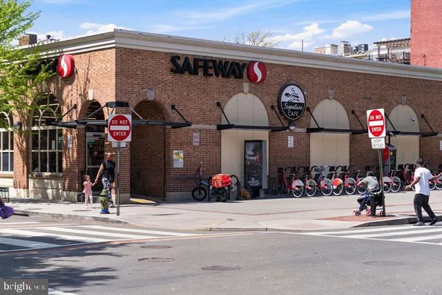 a view of swimming pool with a backyard