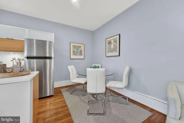 a kitchen with a stove and cabinets