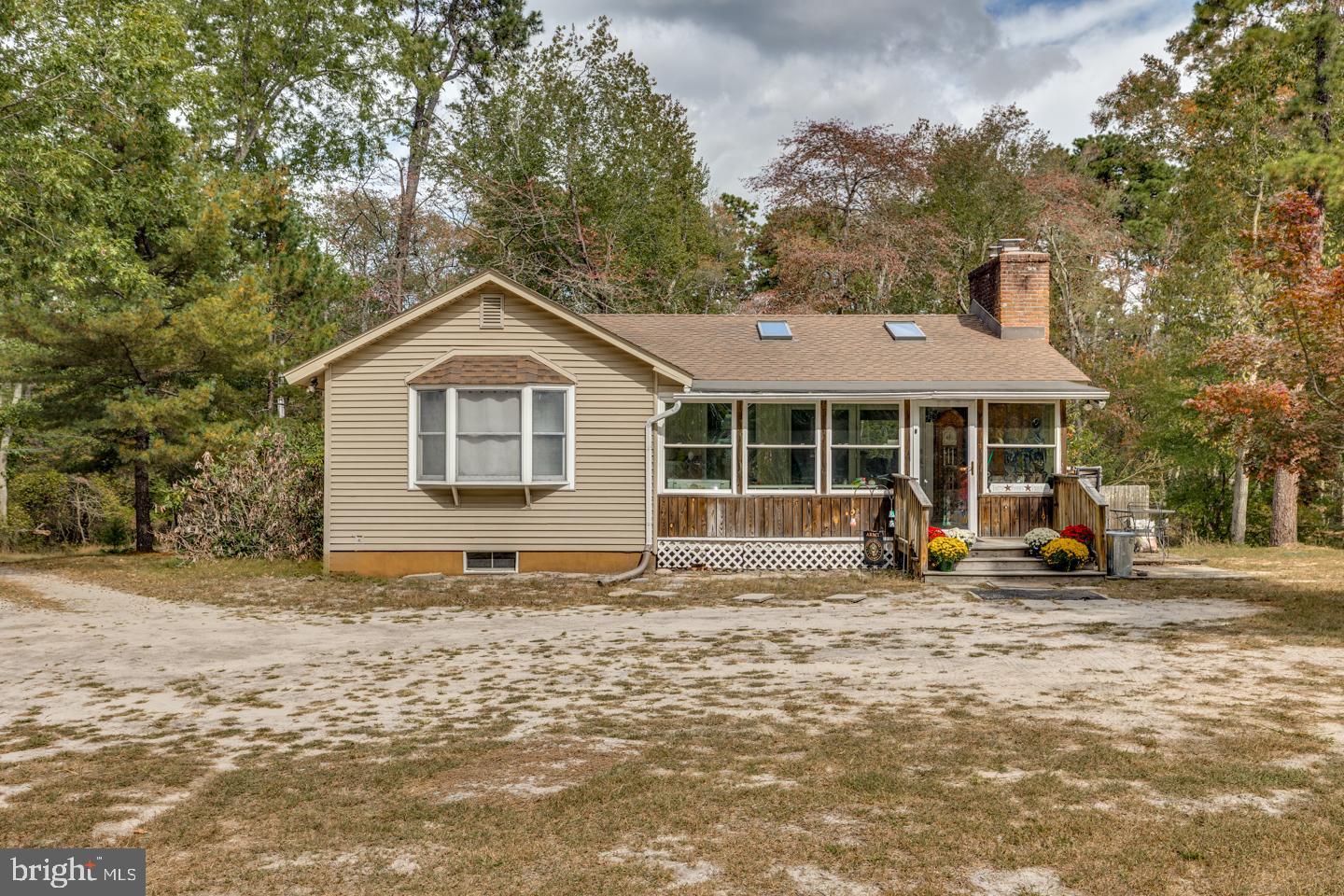 20 Sooy Place Road Southampton, NJ 08088 - Photo 11 of 47 a front view of a house with a yard