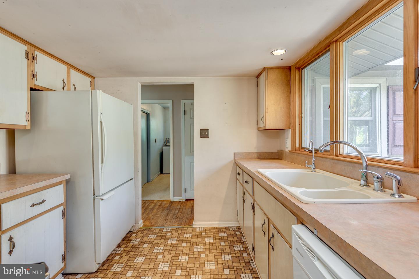 20 Sooy Place Road Southampton, NJ 08088 - Photo 23 of 47 a bathroom with a granite countertop sink a mirror and a shower