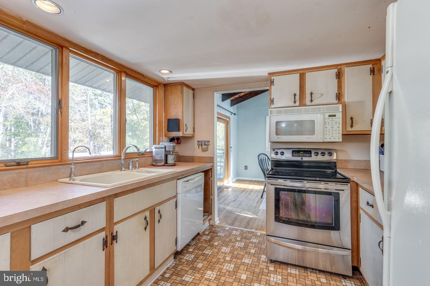20 Sooy Place Road Southampton, NJ 08088 - Photo 24 of 47 a kitchen with a sink stove top oven and refrigerator