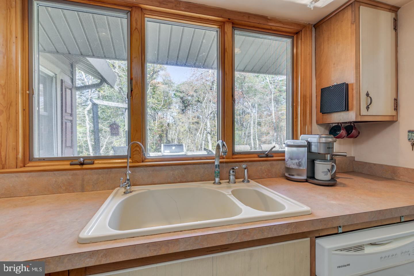 20 Sooy Place Road Southampton, NJ 08088 - Photo 25 of 47 a bathroom with a sink a mirror and a window
