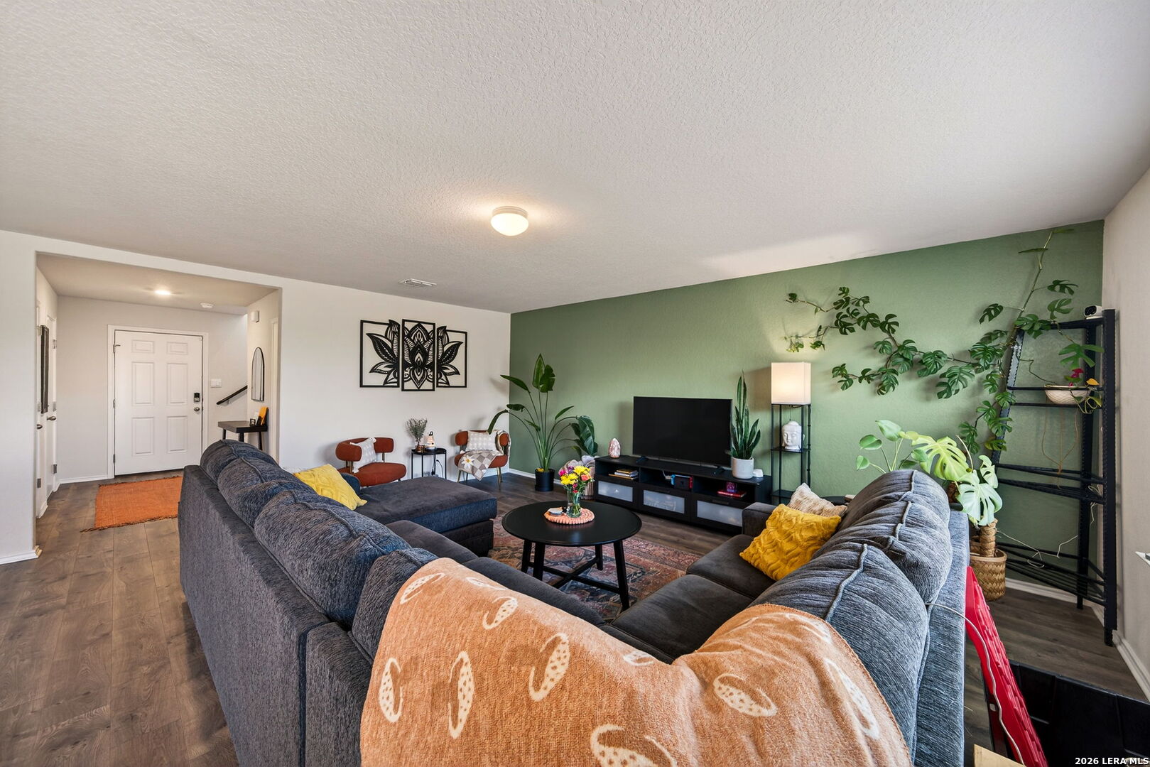 29546 Lost Copper Bulverde, TX 78163 - Photo 5 of 35 a living room with furniture and a flat screen tv