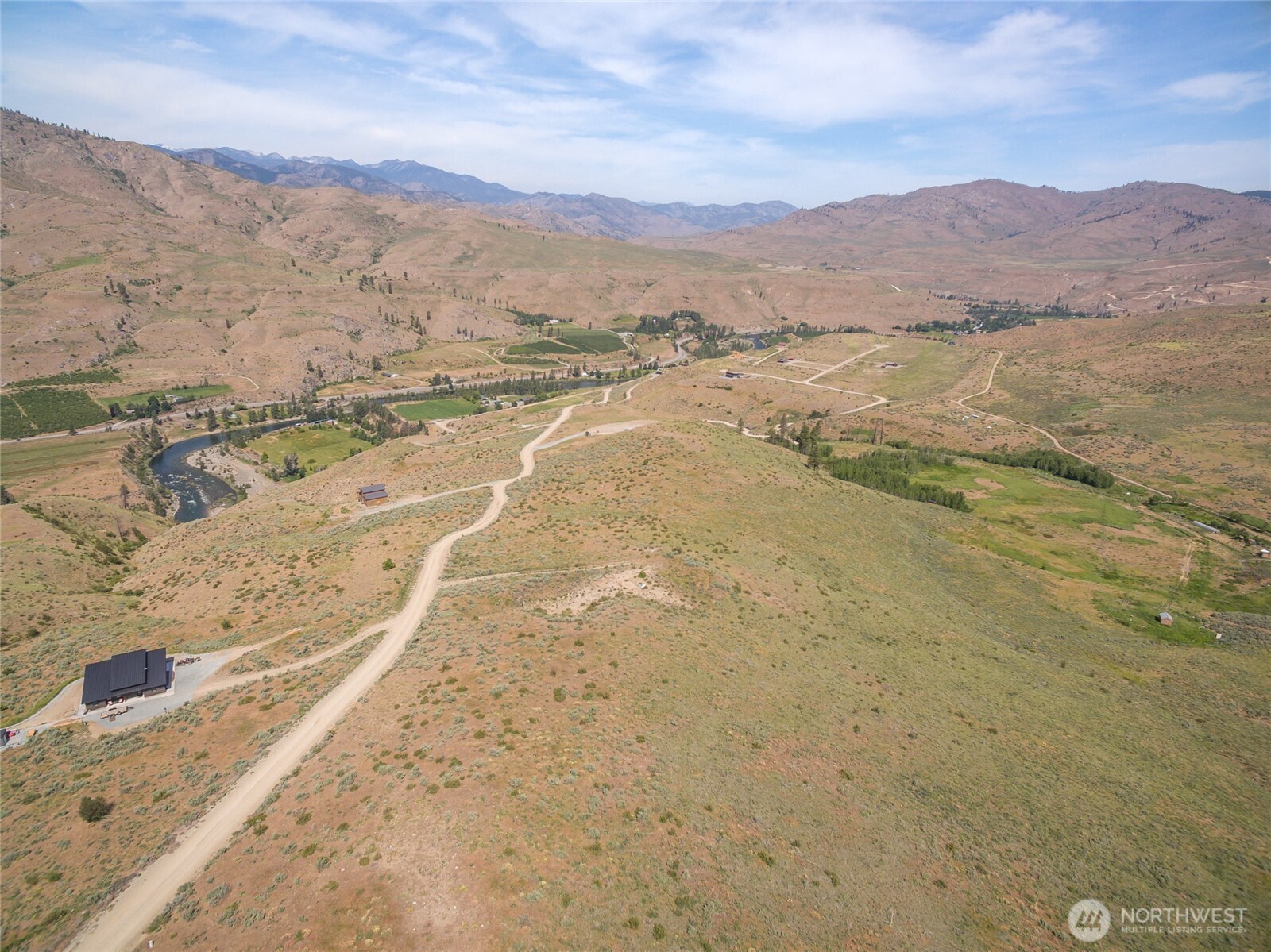 15 Cowboy Road Pateros, WA 98846 - Photo 13 of 15 a view of an ocean beach and mountain