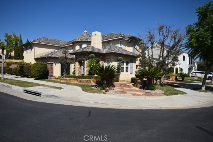 67 Downing Street Ladera Ranch, CA 92694 - Photo 1 of 1 a front view of a house with a yard