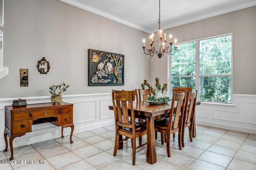 757 Mill Stream Road Ponte Vedra Beach, FL 32082 - Photo 17 of 65 a view of a dining room with furniture window and outside view
