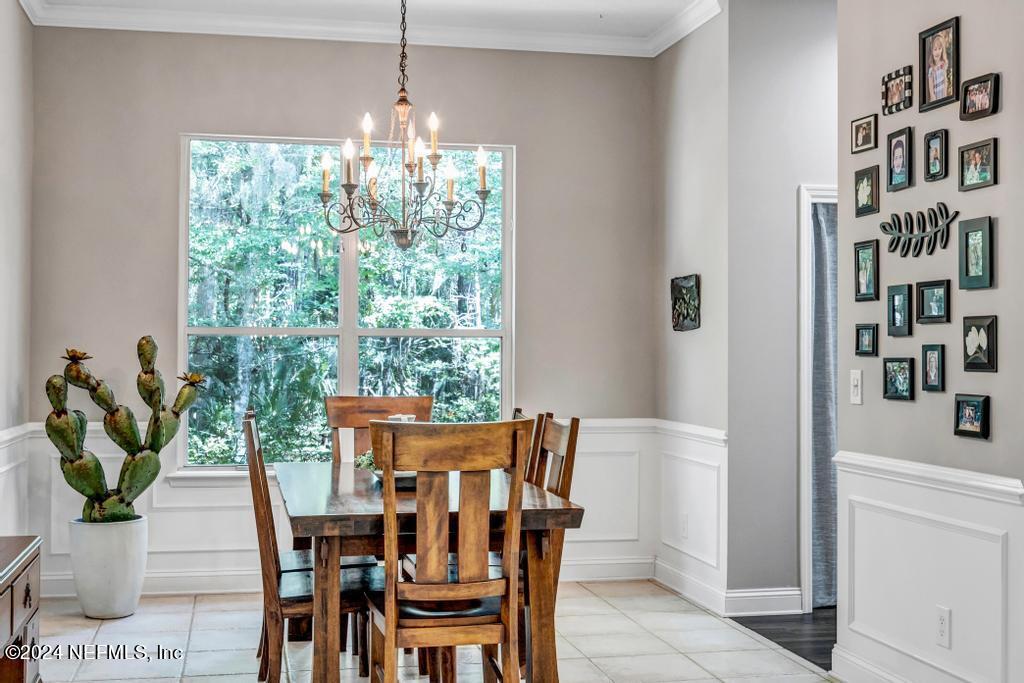 757 Mill Stream Road Ponte Vedra Beach, FL 32082 - Photo 18 of 65 a view of a dining room with furniture window and outside view