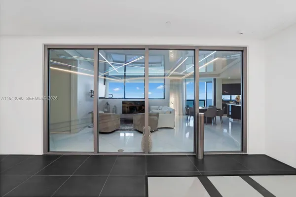 a spacious bedroom with a bed and furniture