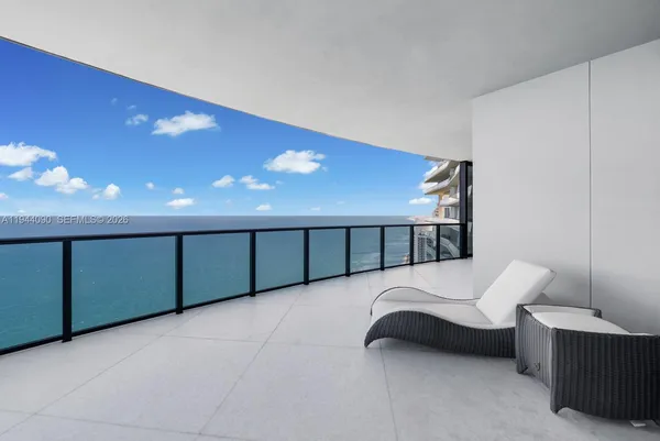 a view of a balcony with an outdoor space