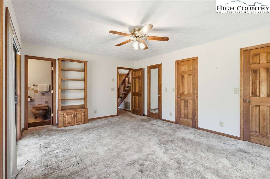 206 Lane L Massey Road Crumpler, NC 28617 - Photo 15 of 36 a view of an empty room with closet and a window