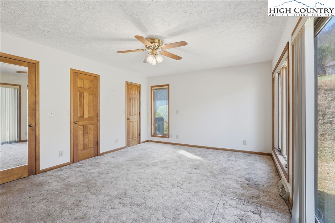 206 Lane L Massey Road Crumpler, NC 28617 - Photo 16 of 36 a view of an empty room and window