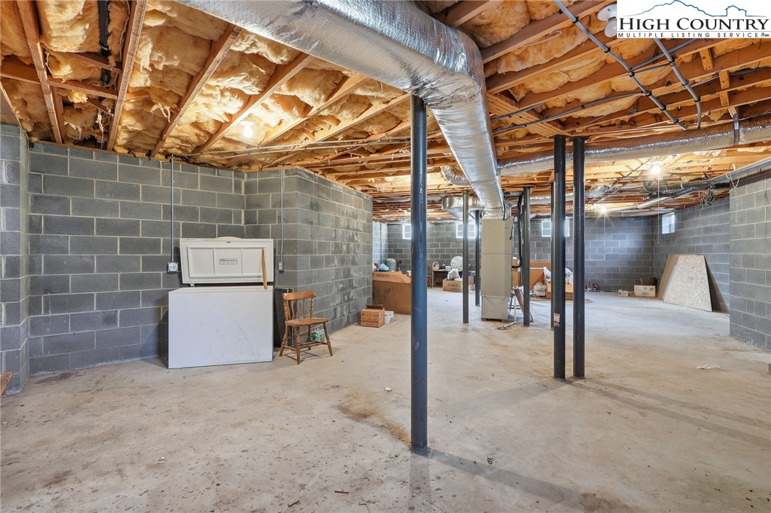 206 Lane L Massey Road Crumpler, NC 28617 - Photo 20 of 36 a view of a room with a wooden fence