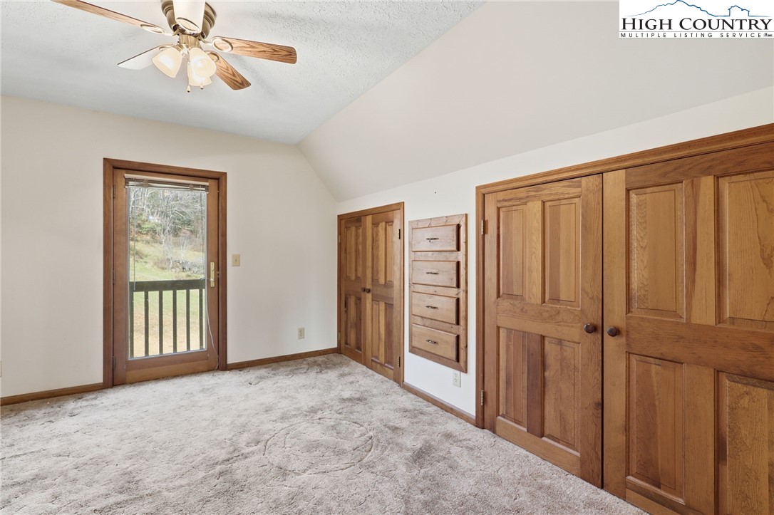 206 Lane L Massey Road Crumpler, NC 28617 - Photo 30 of 36 an empty room with windows closet and windows