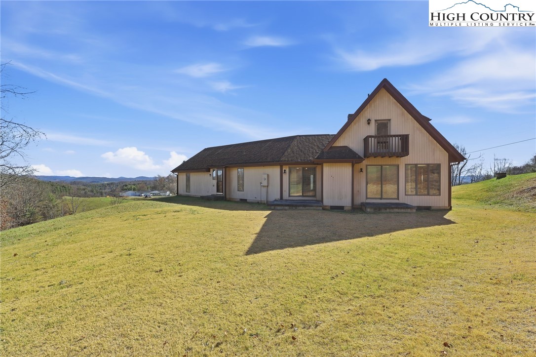 206 Lane L Massey Road Crumpler, NC 28617 - Photo 3 of 36 a front view of a house with a yard