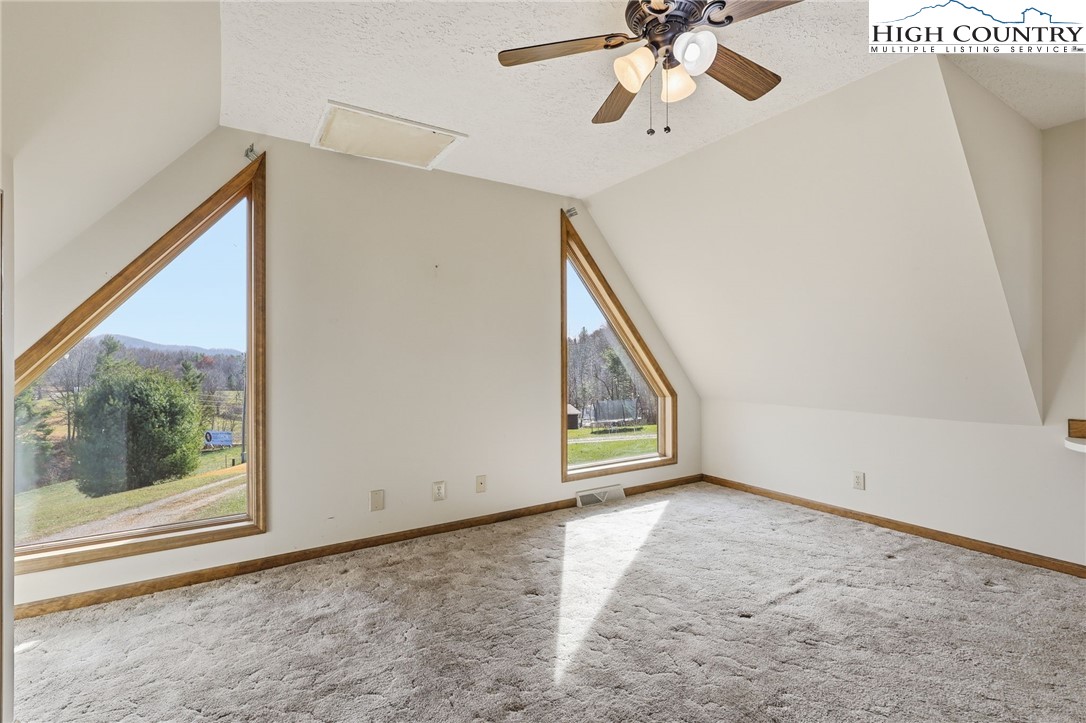 206 Lane L Massey Road Crumpler, NC 28617 - Photo 32 of 36 a view of an empty room with a window