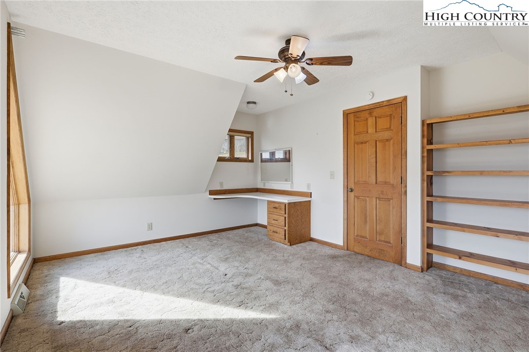 206 Lane L Massey Road Crumpler, NC 28617 - Photo 33 of 36 a view of empty room with a ceiling fan