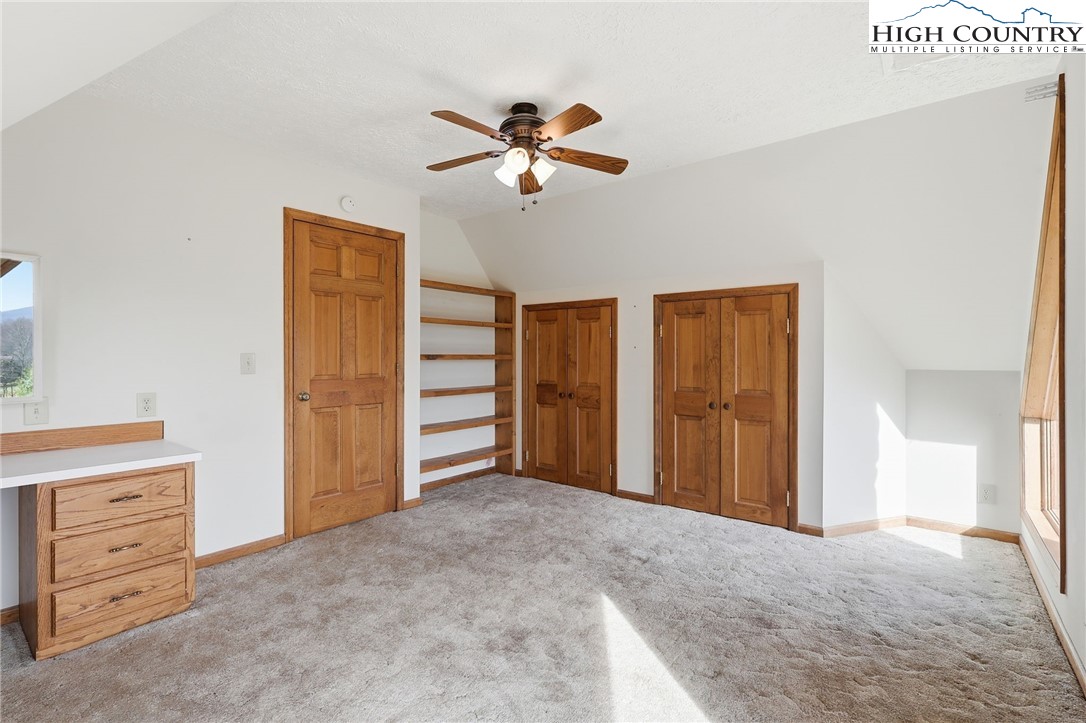206 Lane L Massey Road Crumpler, NC 28617 - Photo 34 of 36 a view of room with cabinet and ceiling fan