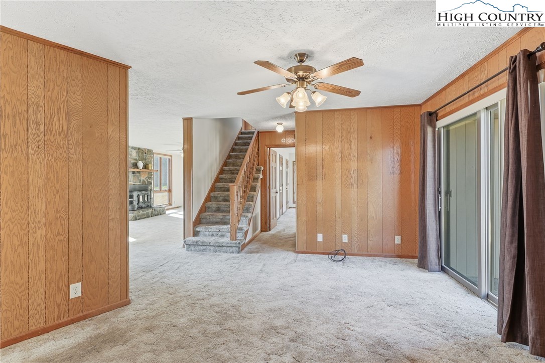 206 Lane L Massey Road Crumpler, NC 28617 - Photo 8 of 36 a view of a livingroom with a staircase