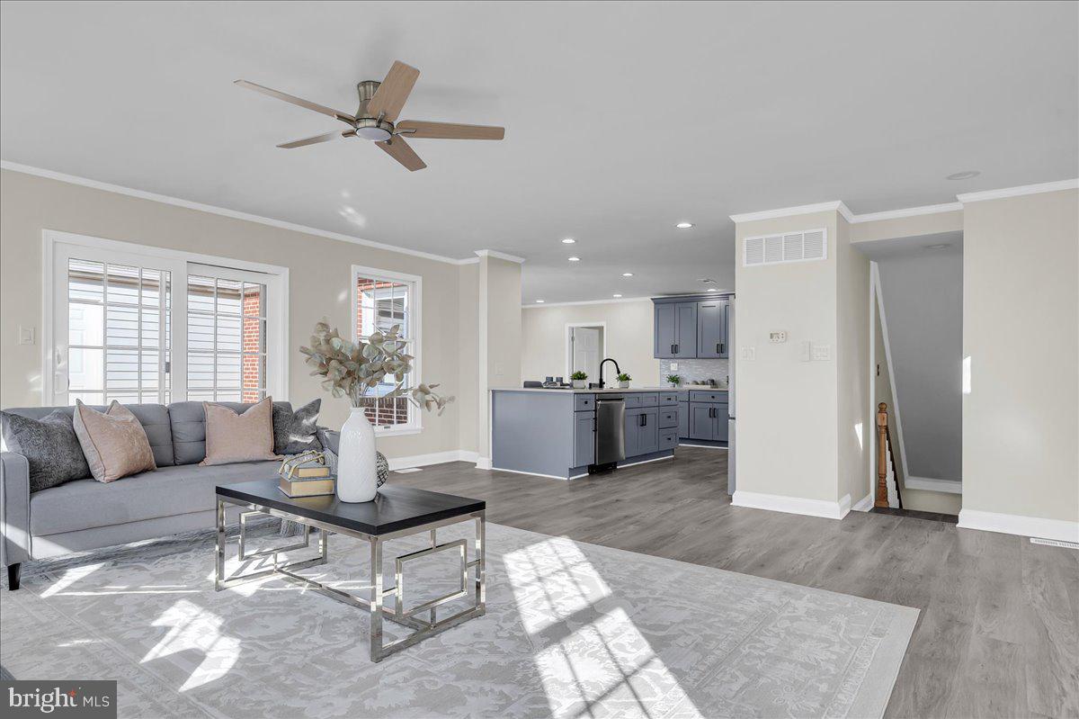12 West Dale Road Wilmington, DE 19810 - Photo 10 of 44 a living room with furniture and kitchen view