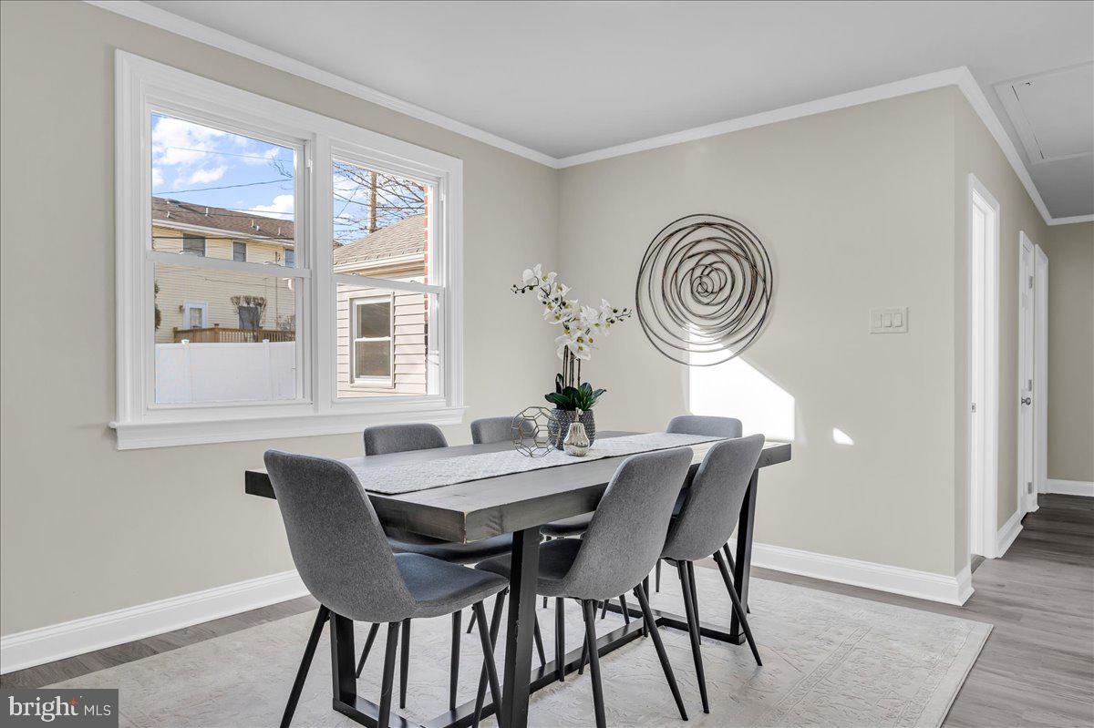 12 West Dale Road Wilmington, DE 19810 - Photo 17 of 44 a view of a dining room with furniture and window