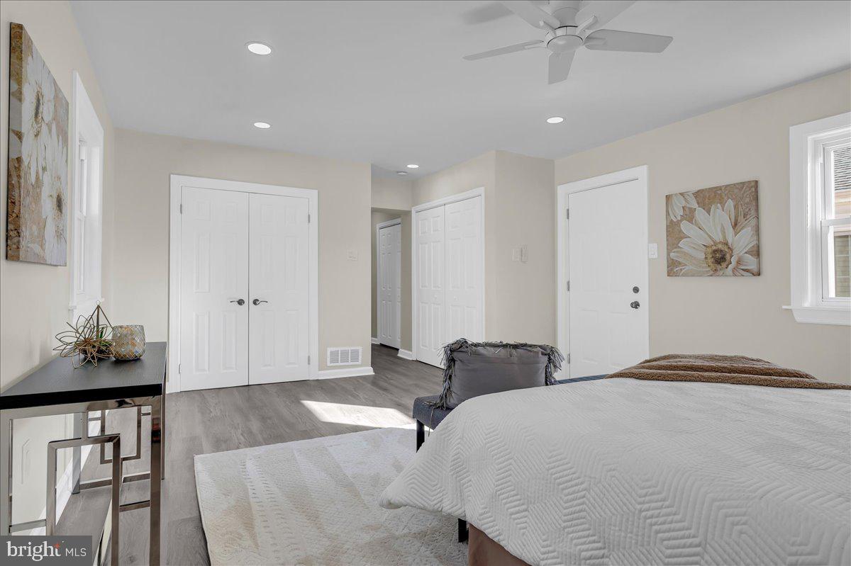 12 West Dale Road Wilmington, DE 19810 - Photo 21 of 44 a bedroom with a bed and a chandelier