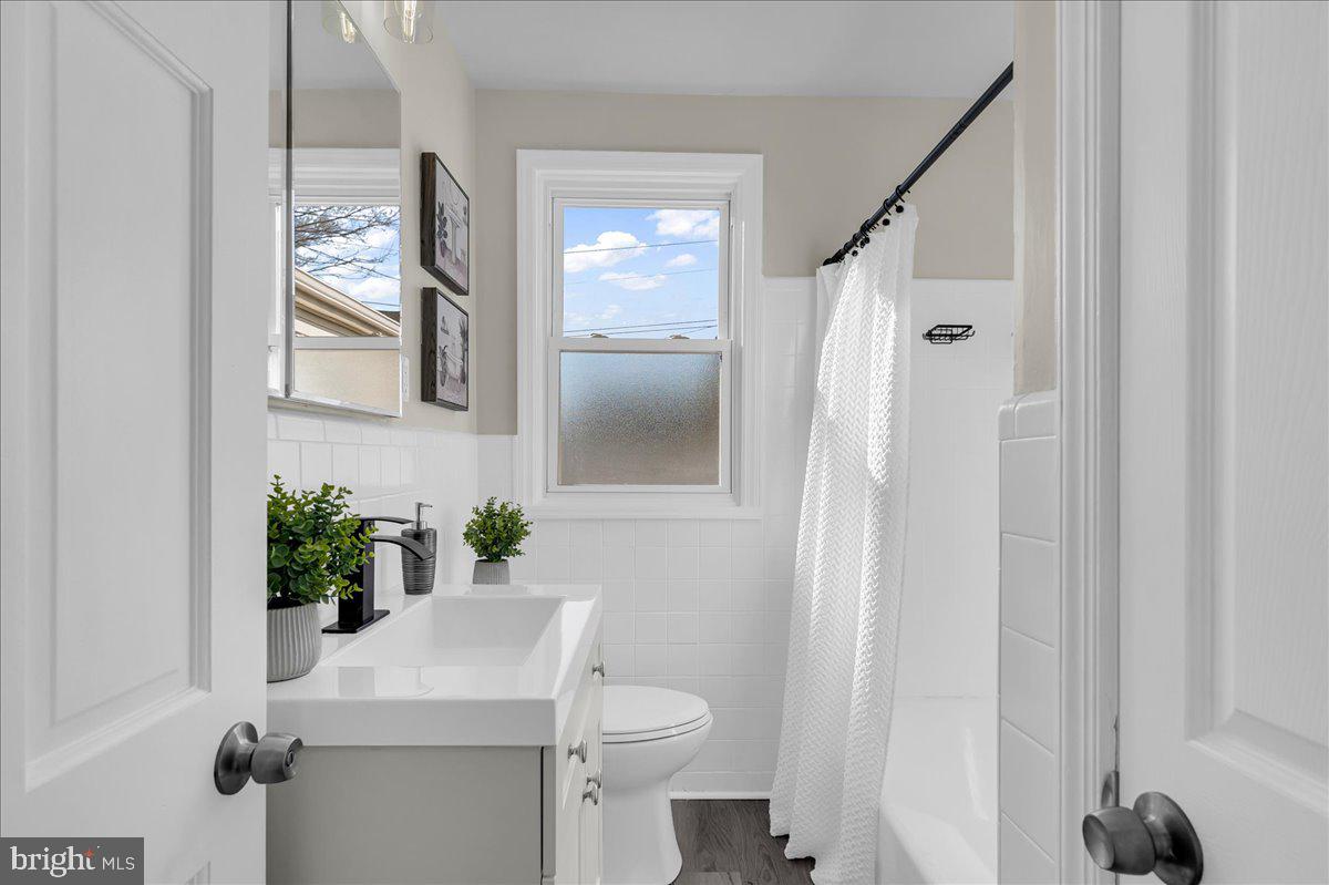 12 West Dale Road Wilmington, DE 19810 - Photo 26 of 44 a bathroom with a sink toilet and shower
